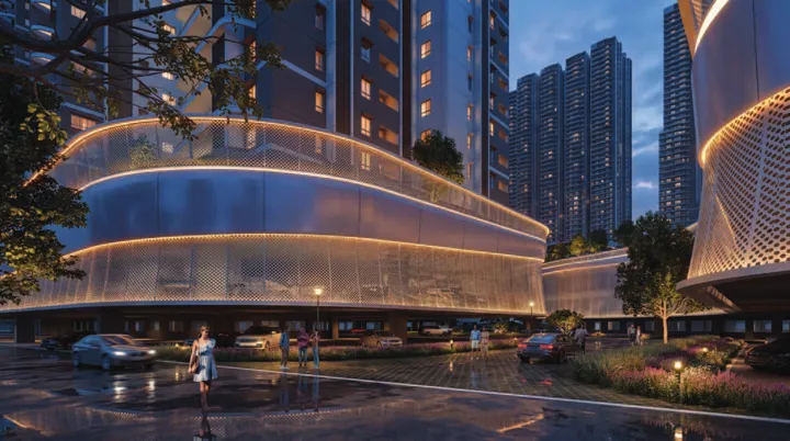 Night view of the clubhouse at Prestige Golden Grove