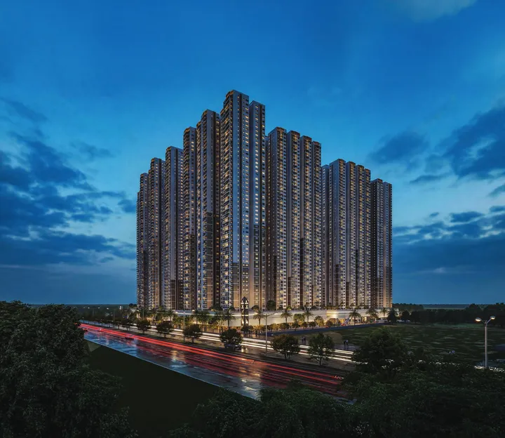 Night view of Prestige Golden Grove high-rise towers.